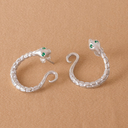ARETES CAZADORA