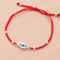 EVIL EYE STRING BRACELET